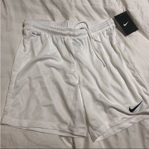 White youth nike dri fit shorts